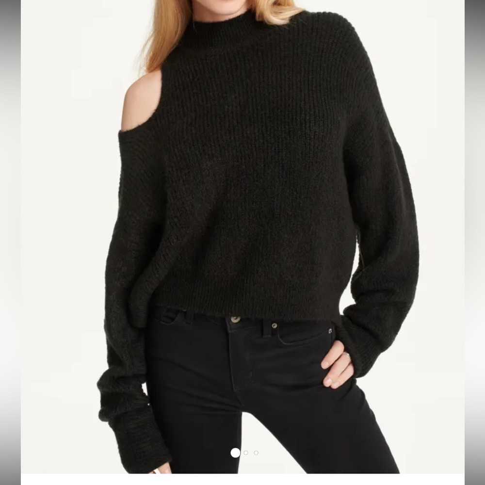 Single cold shoulder black sweater. never worn - tags have been removed !
